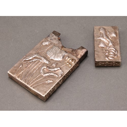 353 - A Chinese silver rectangular visiting card case, chased with lilies and prunus on a textured ground,... 