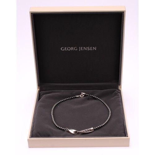 718 - Georg Jensen - a Danish Sterling silver and haematite Moonlight Collection necklace, designed by All... 