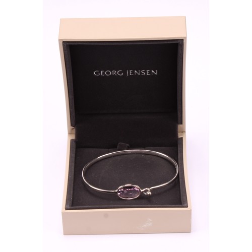 716 - Georg Jensen - a Danish sterling silver and amethyst Savannah bangle, designed by Vivianna Torun Bül... 