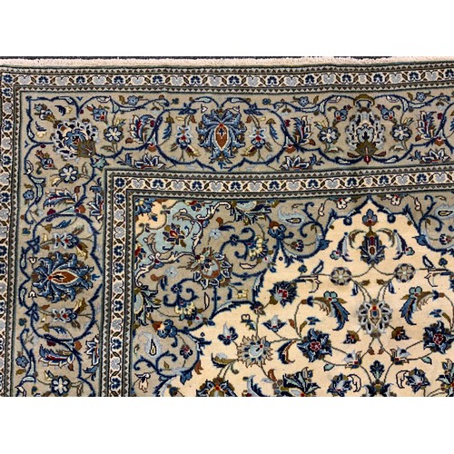 2056 - A Central Persian Kashan carpet, the diamond-shaped medallion within a field of stylised flowers, in... 