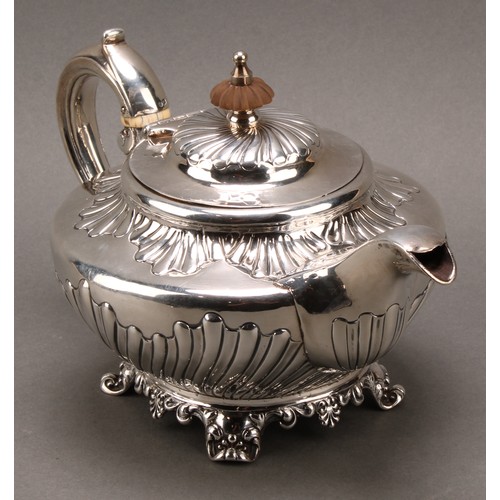 99 - A William IV silver teapot, embossed collar and sides, scrolled handle, floral frieze, John Fry II, ... 