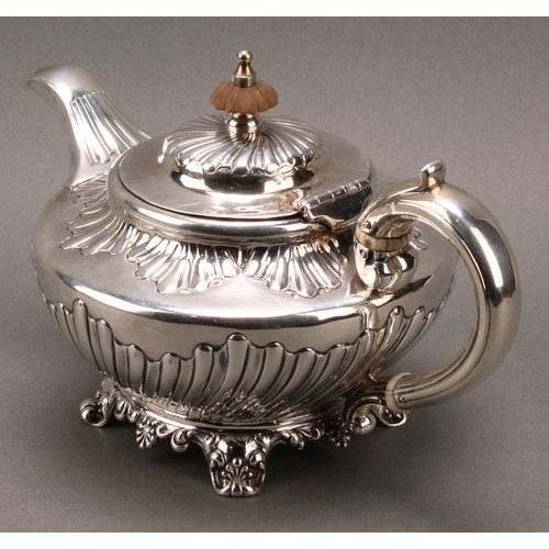 99 - A William IV silver teapot, embossed collar and sides, scrolled handle, floral frieze, John Fry II, ... 