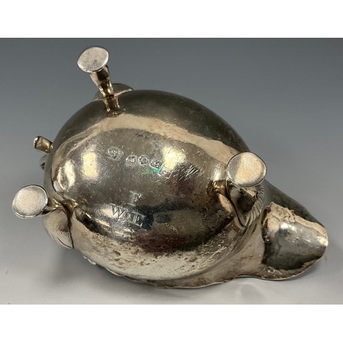 267 - A George II silver sauce boat, shaped rim, scrolled handle, shell and pad feet, London 1749, indisti... 