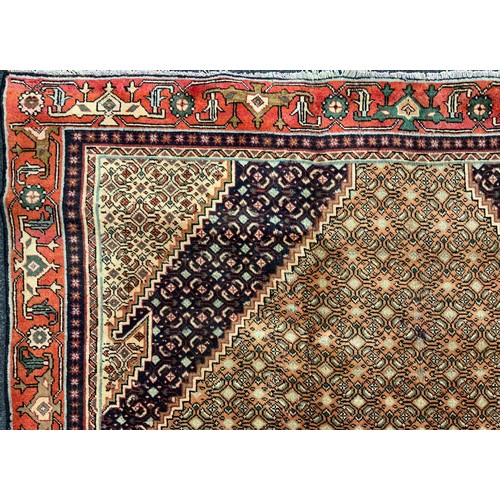 2067 - A Bijar wool and silk mix rug, the diamond shaped medallion within a densely patterned field, in ton... 