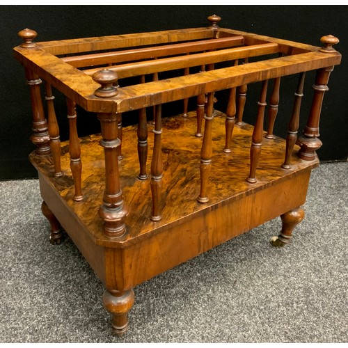 1700 - A Victorian rosewood and walnut three section Canterbury, turned divisions, long drawer to frieze, c... 