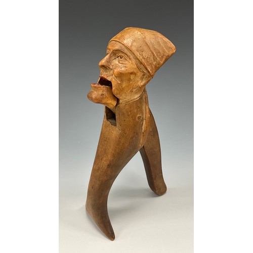 2052 - A 19th century novelty nutcracker carved as an old man in night cap, 21cm long