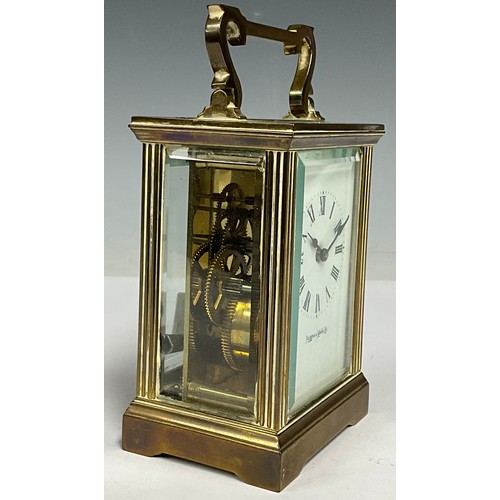 362 - A Mappin & Webb Ltd brass and lacquer carriage clock, fluted columns, bevelled glass, shaped carryin... 