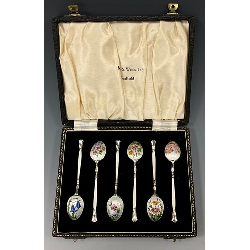 400 - A set of six Elizabeth II enamelled silver spoons, each back decorated with botanical studies of Blu... 