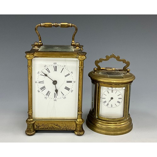 1719 - A French brass carriage clock timepiece, white dial, Roman numerals, four glass brass case, 14cm hig... 