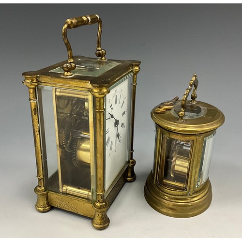 1719 - A French brass carriage clock timepiece, white dial, Roman numerals, four glass brass case, 14cm hig... 