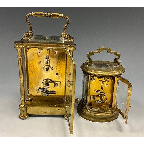 1719 - A French brass carriage clock timepiece, white dial, Roman numerals, four glass brass case, 14cm hig... 