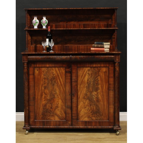 1631 - An early Victorian mahogany chiffonier, the superstructure with two shelves, rectangular top above a... 