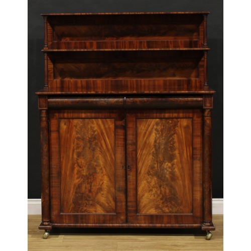 1631 - An early Victorian mahogany chiffonier, the superstructure with two shelves, rectangular top above a... 