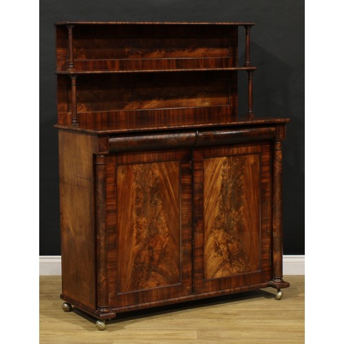 1631 - An early Victorian mahogany chiffonier, the superstructure with two shelves, rectangular top above a... 