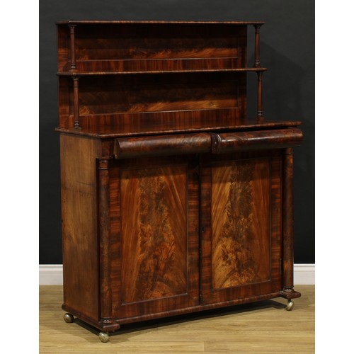 1631 - An early Victorian mahogany chiffonier, the superstructure with two shelves, rectangular top above a... 