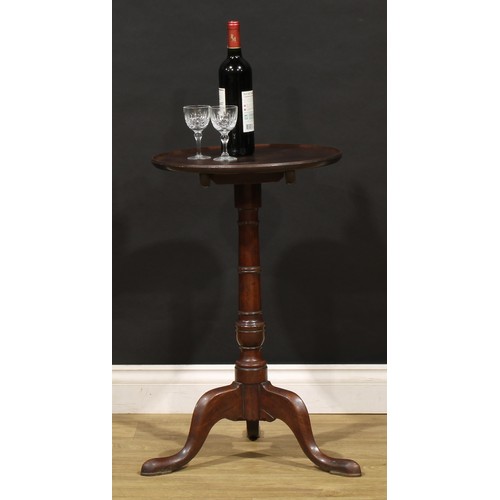 1774 - A George III mahogany tripod wine table, dished circular top, turned column, cabriole legs, pointed ... 