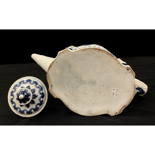 1205 - A Hawley blue and white pearlware teapot, in the commode shape, moulded in relief with linen swags a... 