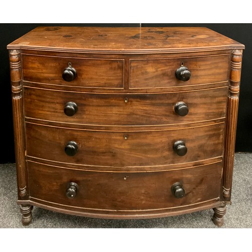 2132 - A Regency mahogany bow front chest, slightly oversailing top with reeded edge above two short above ... 