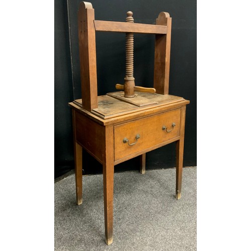 1673 - A 19th century oak book press on stand, long drawer to frieze, 144cm high, 72.5cm wide, 48.5cm deep,... 