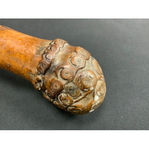 1878 - An Aesthetic Movement umbrella, bamboo cane, the pommel carved with rows of circular bosses, cotton ... 