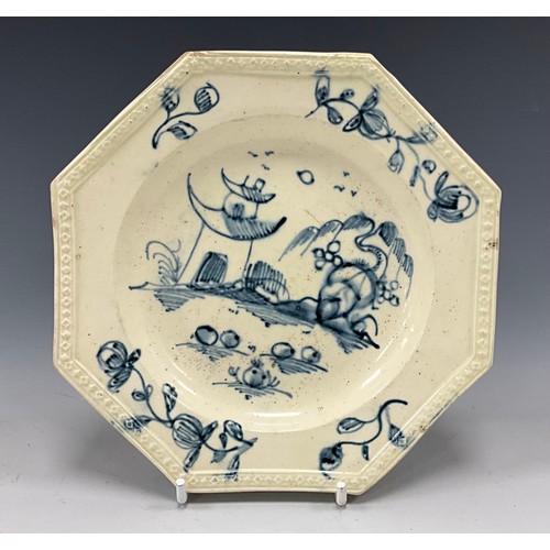 1203 - A English creamware Plate, octagonal shape with moulded border, painted blue detail, 15.3cm wide, c.... 