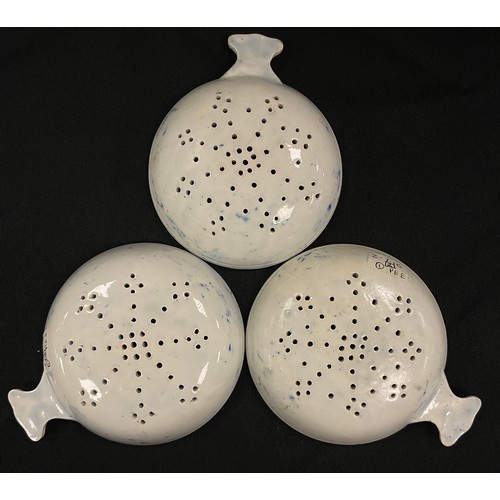 1204 - A group of three 19th century pearlware Milsey strainers, blue transfer print, 9cm diameter, c.1820 ... 