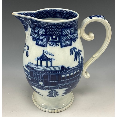 1187 - A 19th century pearlware blue and white transfer-printed pitcher, decorated with a Boy on a Buffalo,... 