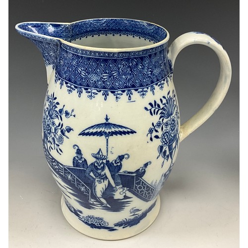 1187 - A 19th century pearlware blue and white transfer-printed pitcher, decorated with a Boy on a Buffalo,... 