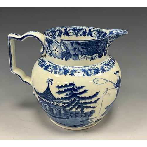 1187 - A 19th century pearlware blue and white transfer-printed pitcher, decorated with a Boy on a Buffalo,... 