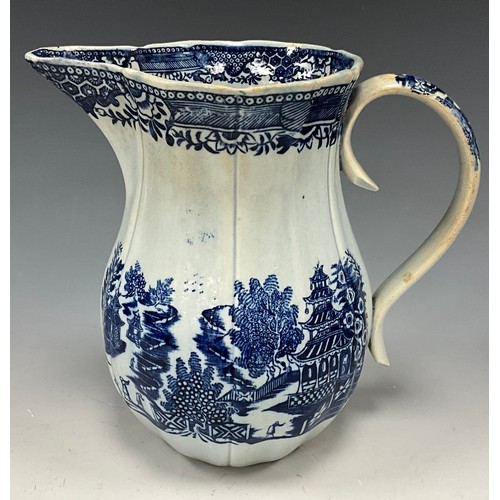 1187 - A 19th century pearlware blue and white transfer-printed pitcher, decorated with a Boy on a Buffalo,... 