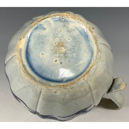 1187 - A 19th century pearlware blue and white transfer-printed pitcher, decorated with a Boy on a Buffalo,... 