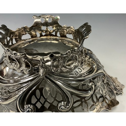 273 - A Victorian silver oval bonbon dish, pierced and cast with floral swags and motifs, London 1894, 7cm... 