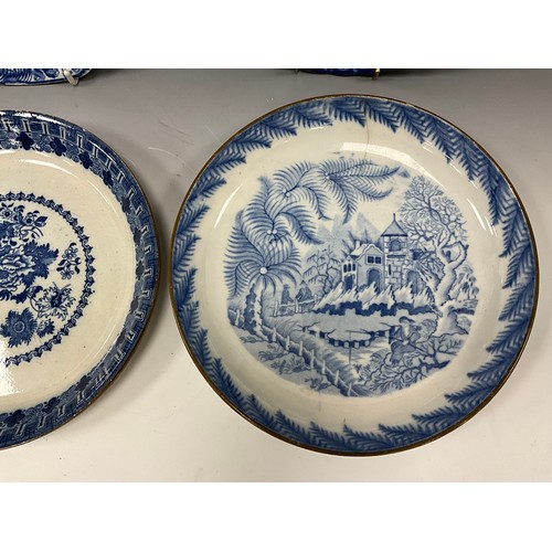 1163 - 19th century blue and white pearlware plates, transfer printed including a children fishing and brid... 