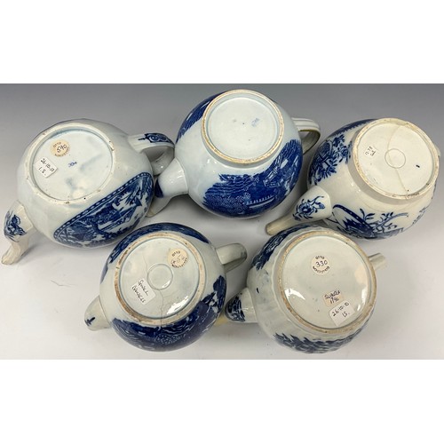 1157 - 18th century blue and white pearlware tea pots including a Swansea tea pot, fluted body, decorated w... 