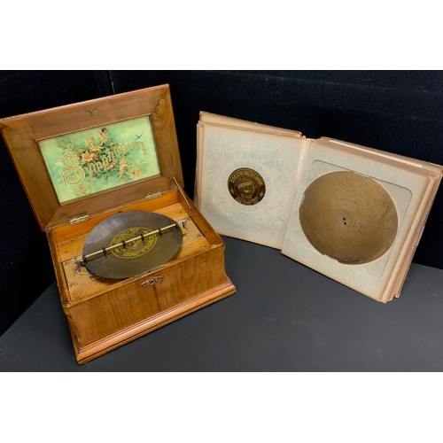 2050 - A Victorian symphonium music disc player, playing 10 3/4 inch and smaller discs, with two section st... 