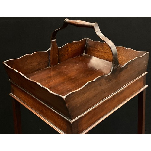 1771 - A George III mahogany tray on stand, scalloped shaped gallery, x-shaped stretcher, tapering chamfere... 