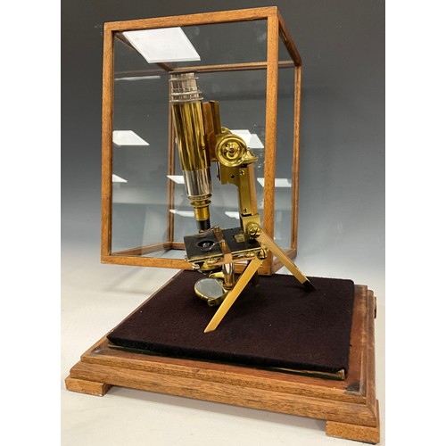 2078 - An early 20th Century brass monocular microscope by J Swift and Son London No 624, single lens on fo... 