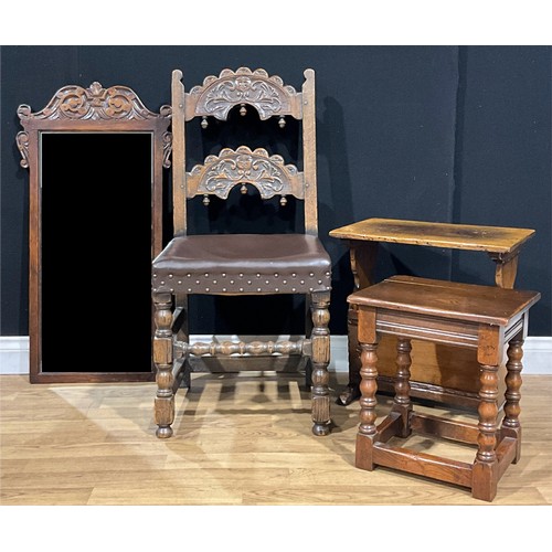 108 - A 17th century style oak Derbyshire chair; an oak periodical rack, probably Titchmarsh & Goodwin; a ... 