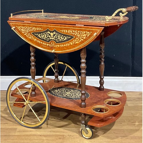 113 - An Italian marquetry bar cart or drinks trolley, the drop leaves with brass galleries, 77cm high ove... 