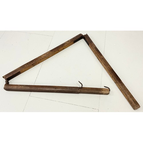 1878A - A WWI folding trench ladder, elm and cast iron construction, folding into three main sections, with ... 