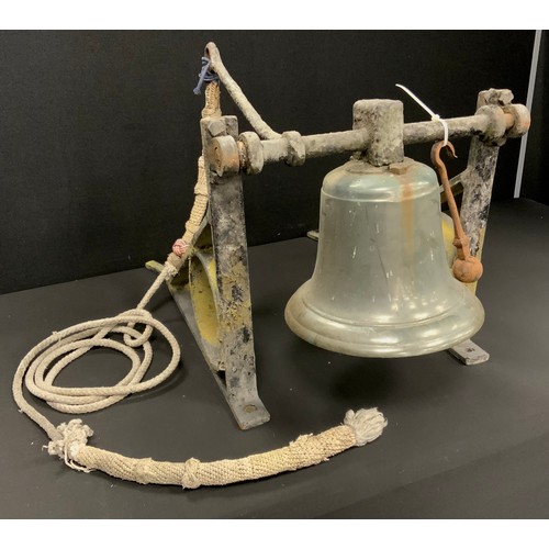 2149 - A 19th century cast iron bell, from Hathersage Hall, with original cast iron wall brackets, the bell... 