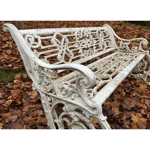 1997 - A Coalbrookdale style Cast iron garden bench, leafy scroll ends, scroll arms, woven geometric design... 