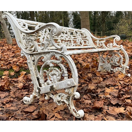 1997 - A Coalbrookdale style Cast iron garden bench, leafy scroll ends, scroll arms, woven geometric design... 