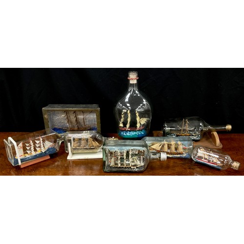 2154 - Maritime Interest - early 20th century ships in bottles including Rosella, 22cm long; others (8)