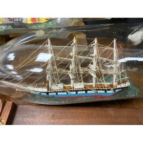 2155 - Maritime Interest - early 20th century hand crafted ships in bottles including Quito, 30cm long; oth... 