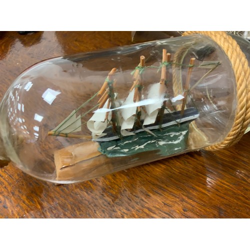 2155 - Maritime Interest - early 20th century hand crafted ships in bottles including Quito, 30cm long; oth... 