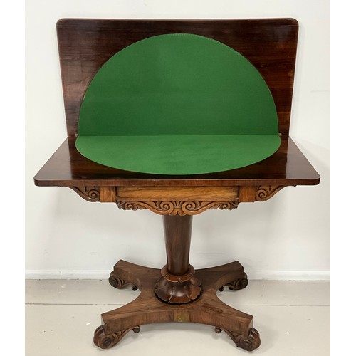 1797 - A William IV rosewood card table, carved frieze, tapering cylindrical support with carved lotus to b... 