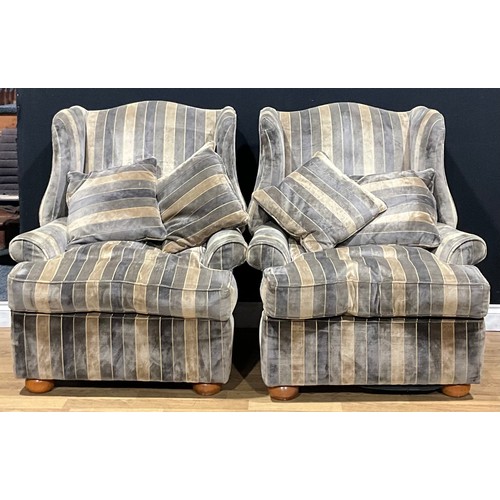 110A - A pair of George II inspired wing chairs, 106cm high, 90cm wide, the seat 55cm deep (2)

NB - This l... 