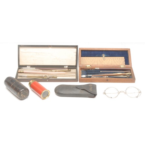 595 - Geometry - an assortment of compasses, scalpels, and other stationary equipment, cased in an Edwardi... 