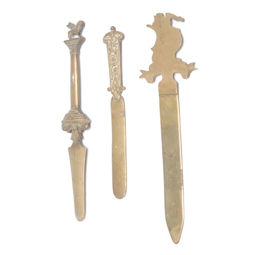 596 - A 19th century Italian Grand Tour brass page turner or letter knife, the haft cast with the Winged L... 